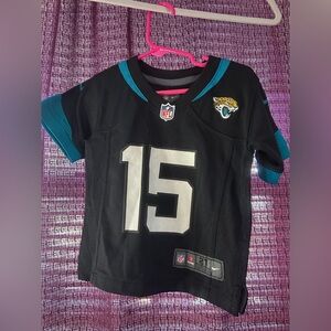 Nike Kids Black and Teal Jaguars Jersey Minshew II